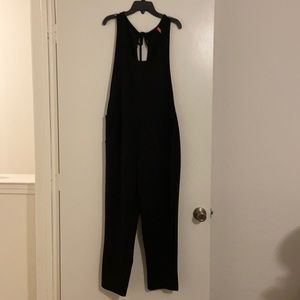 Jumper with open back and sides. NWOT